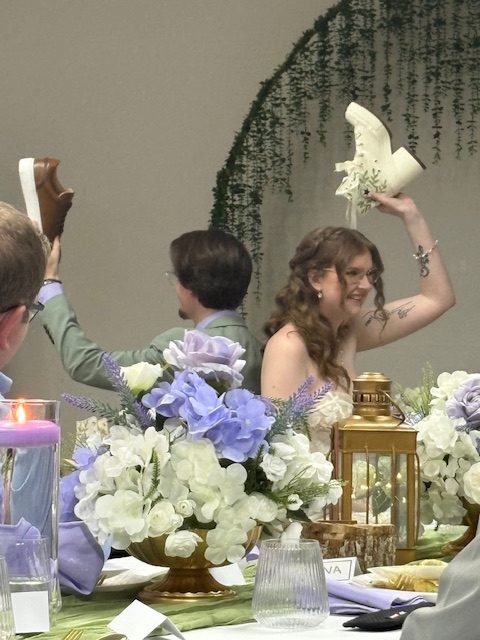 Some couples do the wedding shoe game;  Mr. and Mrs. Cook shared some fun at the reception. 